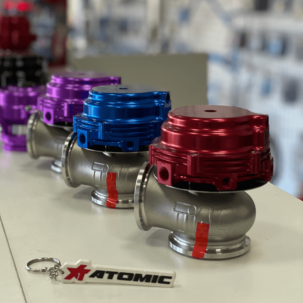 Aftermarket Blow-Off Valve (BOV) installed on a turbocharge pipe to vent excess boost pressure and prevent compressor surge| ATOMIC-SHOP