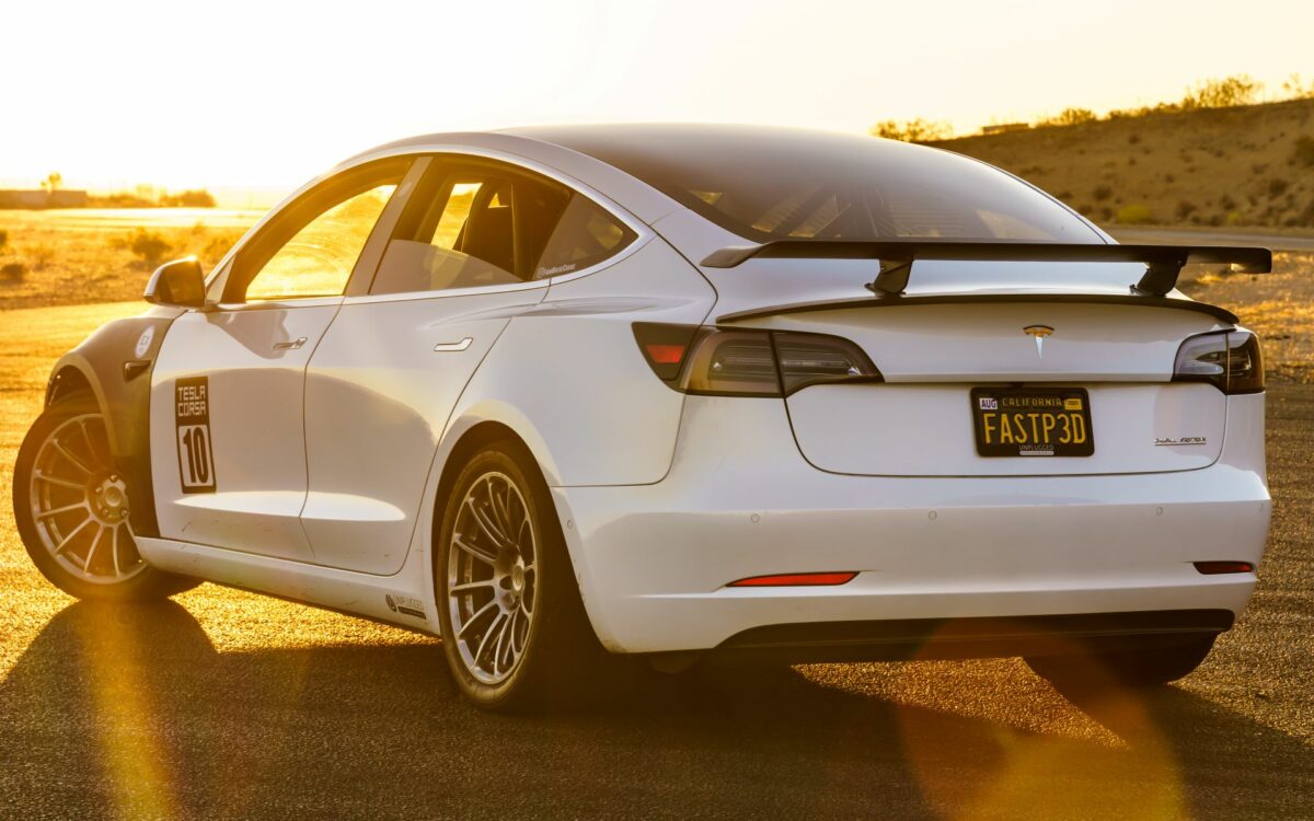 UNPLUGGED PERFORMANCE UP-M3MY-309-4.1 Dual Rear Spoiler - Wing Base Only, Gloss Carbon for TESLA Model 3 Photo-0