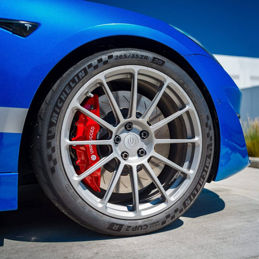 UNPLUGGED PERFORMANCE UP-M3MY-317-7.1 Big Brake Kit (front) UP x PFC, 394mm Iron Rotors, Street Pads for TESLA Model 3 / Model Y Photo-0