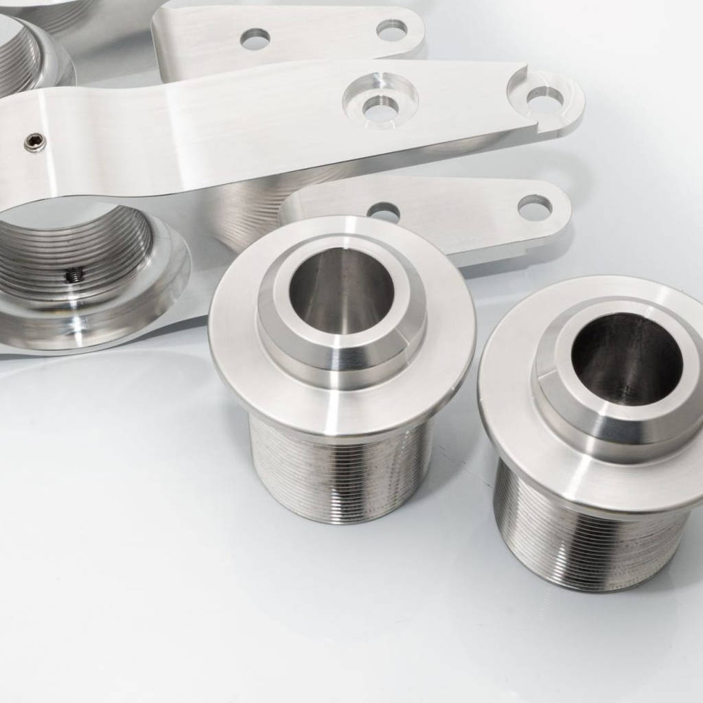 UNPLUGGED PERFORMANCE UP-M3MY-320-1.1 Billet Adjustable Rear Lower Spring Arm Pair for TESLA Model 3 / Model Y Photo-1 