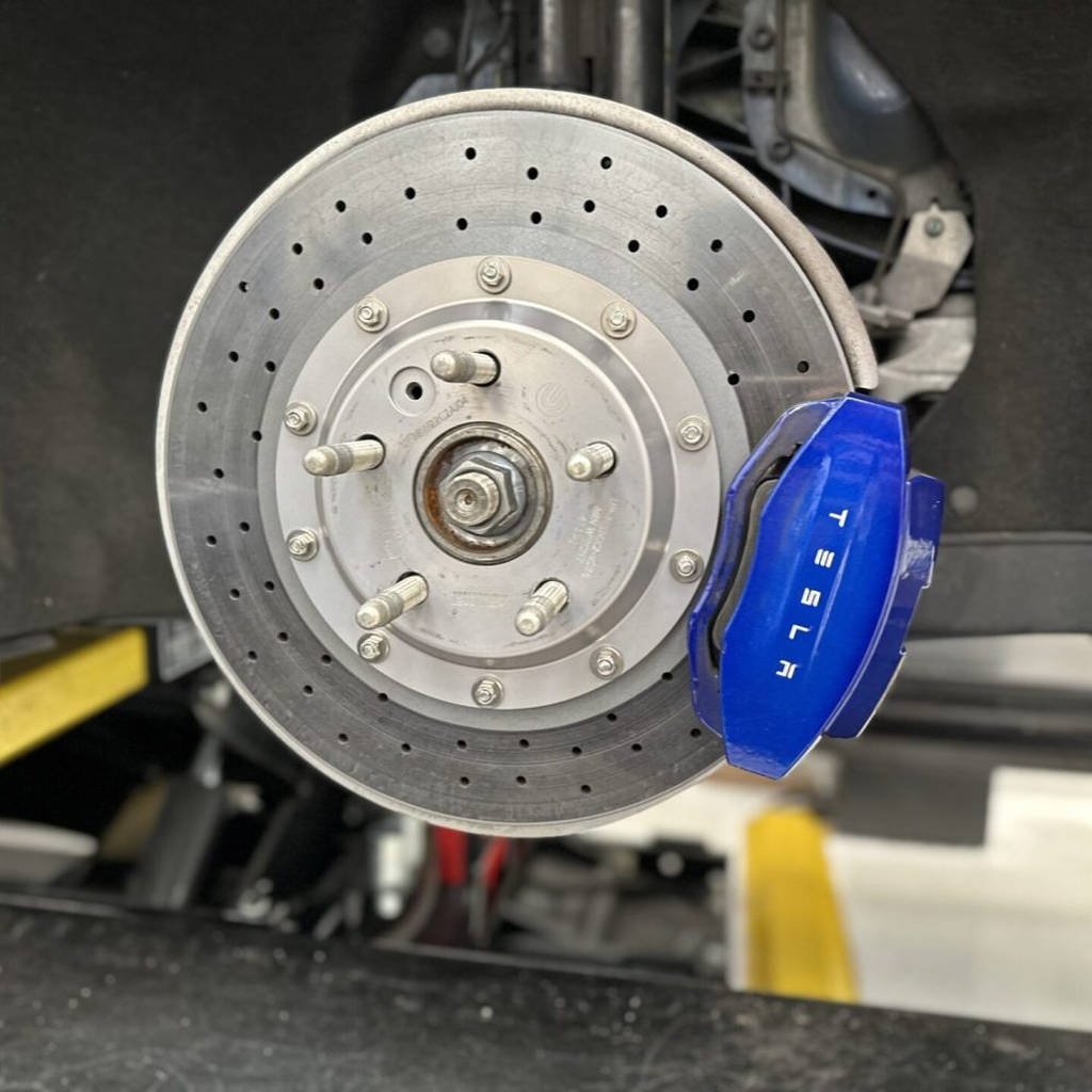UNPLUGGED PERFORMANCE UP-MSMX2-133-2.1 Rear Brake Rotor Kit, Large Sweep, Carbon Ceramic + Racing Pad Kit for TESLA Model S 2021 Photo-1 